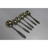 Norwegian silver, to include a set of six spoons and a larger spoon, (7)