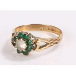 9 carat gold ring, with a flower head design, ring size N