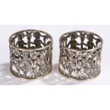 Pair of silver napkin rings, with a classical scene and putto, 45 grams