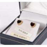 Pair of 9 carat gold garnet set heart shape earrings