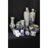 Collection of Delft & similar blue and white china, to include windmills, bells, pots and covers