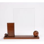 20th Century picture frame, with bevelled glass plate supported by a carved orb and rectangle, on