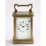 French brass cased carriage clock, the white enamel dial with Roman numerals