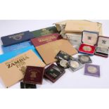 Collection of coins sets, to include various countries, a silver proof Crown, further Crowns,