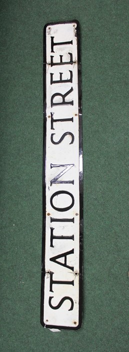Enamel road sign, Station Street, with black border, 118.5cm x 15cm