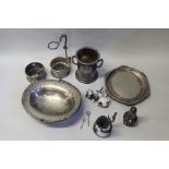 Silver plated wares, to include a tray, a basket, a bottle carrier, tulip vase, etc, (qty)