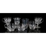 Seven 19th Century glasses, three custard cups of various panel decoration, two cut glass custard