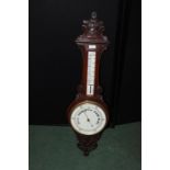 Oak barometer, with a thermometer and dial, 88cm high