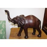 leather clad model of an elephant, standing position, 50cm long, 40cm high