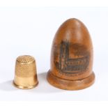 19th Century sewing interest Mauchline ware, formed in an egg shape with a picture of Cromer