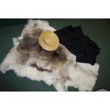 Fur rug, together with two fur hats, a straw boater and mortar boards with capes