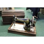 Singer manually operated sewing machine in original case