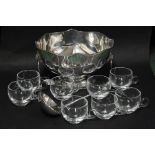 Silver plated punch bowl, together with a ladle and six glass punch cups, (8)