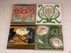 4 Jugendstilkacheln - Keramik, unterschiedliche florale Fadenreliefdekore, polychrom bemalt und