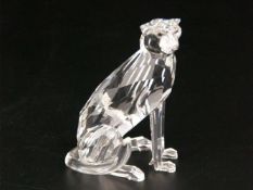 Kristallglasfigur Swarovski - "Panther", sitzende Pantherfigur, mit gelb-grünen Augen, Unterseite