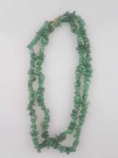 Jadekette - Kette aus unregelmäßigen polierten grünen Jadesteinen, vergoldete Schließe, L.ca.80cm