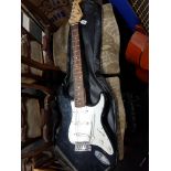 SQUIRE STRAT BY FENDER WITH AMPLIFIER & CASE ON STAND