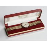 9CT GOLD GENTS ROAMER LIMELIGHT AUTO WATCH WITH 9CT GOLD MAINLINE BRACELET