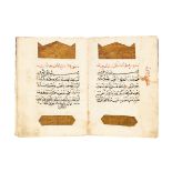 Ɵ Qur'an in 30 Juz', copied by Ahmed Amer Zeyd al-Shafei, in Arabic, decorated manuscript on paper