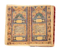 Ɵ A Fine Pocket-Sized Qur'an, in Arabic, illuminated manuscript on paper [Qajar Persia, c. 1800 AD]