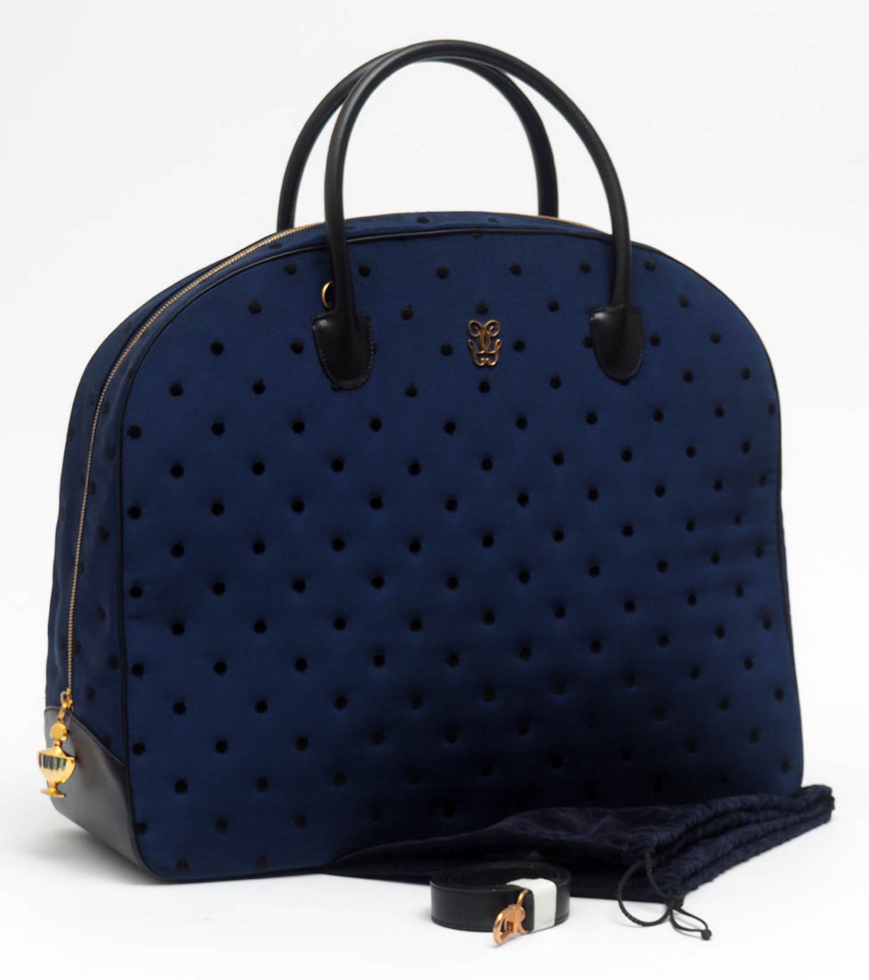 Große Tasche, Guerlain Halbrunder Korpus aus blauem Stoff mit schwarzen Punkten. Goldfarbener