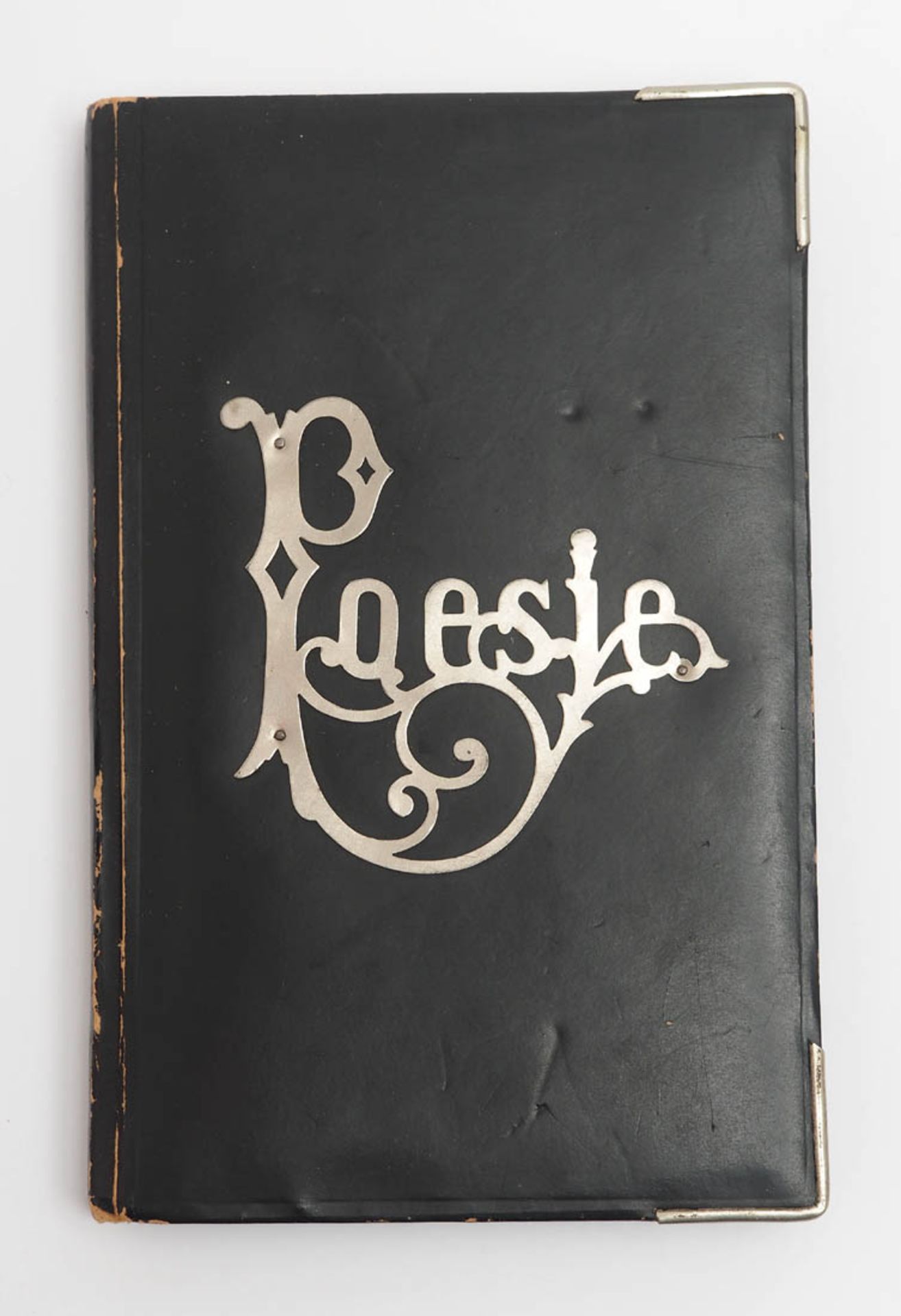 Poesiealbum, 1889 Ledereinband mit Metallecken und silbernem (?) Beschlag "Poesie". Goldschnitt. L.