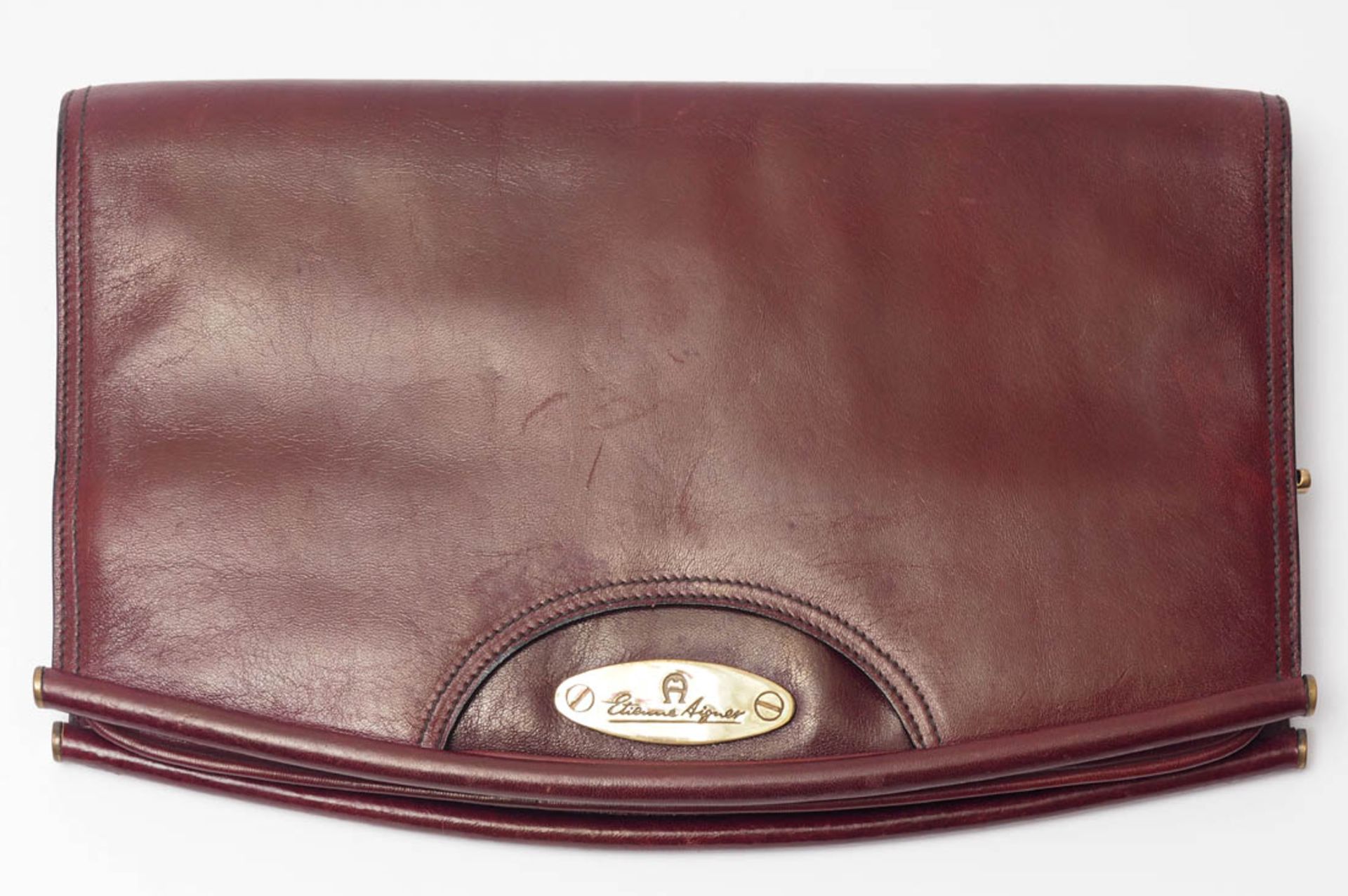 Damenhandtasche (Clutch), Aigner Bordeauxrotes Leder. 18x29cm. Dazu ein Geldbeutel, Aigner.