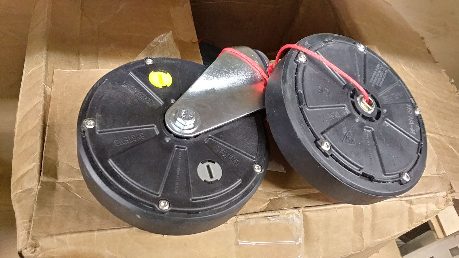 BOX OF SHOPPING CART SECURITY WHEELS