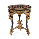 A gilt and black lacquered center table
