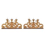 A pair of gilt and carved wood three-branch appliques