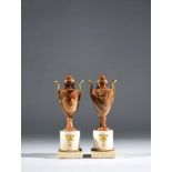 A pair of French gilt-bronze mounted alabaster potiches