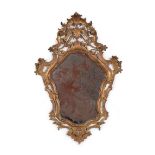 A small gilt-wood wall mirror