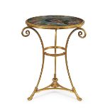 An elegant gilt bronze gueridon with a round painted marble top