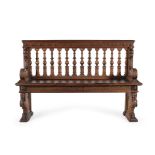 An antique walnut carved bench
