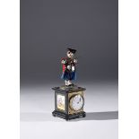 A patinated bronze and polychrome silver enamel viennese table clock