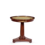 A mahogany circular openable glass top table