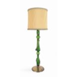 A green and orange glass floor lamp