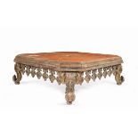 A lacquered and gilt-wood coffee table