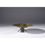 A silver circular stand with enamel cup, '30s