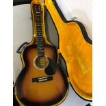 Martin Smith acoustic guitar with fitted hard travel case