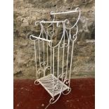 Cast metal towel rail.