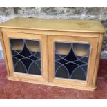 A large farm house pine sideboard with 2 lead & glass doors