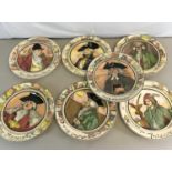 A collection of 7 Royal Doulton collectors plates depicting various characters