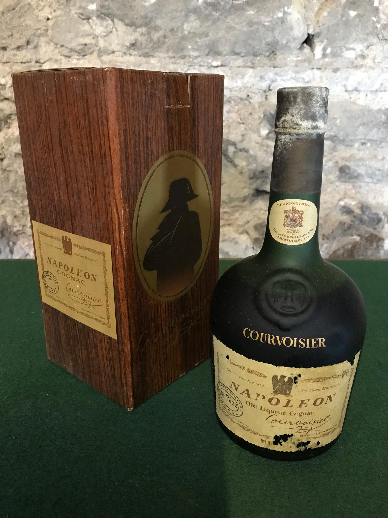 Courvoisier Napoleon old Liqueur cognac dated from the 60's or 70's. full & sealed with original box