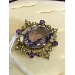 Victorian yellow metal ladies brooch, Set with amethysts & pearls