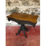 Early Victorian highly carved ornate flip top table