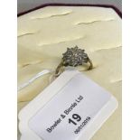 9ct gold ladies ring set with a diamond cluster