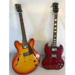 2 Electric guitars one in the style of Gibson