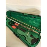 Archetto green violin in its fitted case together with Bundy, The Selmer Company USA, Piccolo.