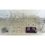 A large collection of Edinburgh crystal wine, brandy, whisky glasses together with royal Doulton